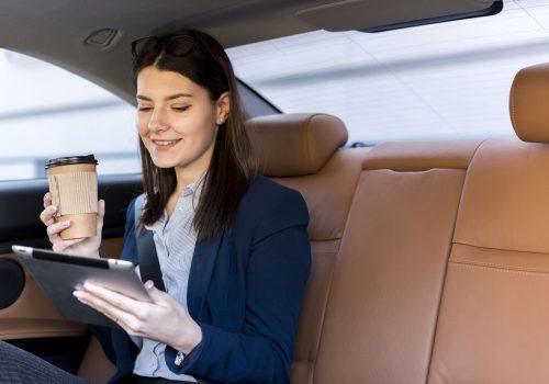 brunette-businesswoman-inside-car